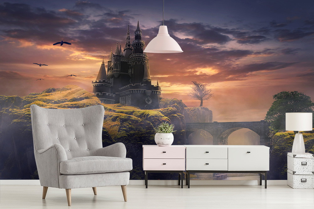 Papier peint photo - Fantastique château sur une colline, entouré d'un paysage enchanteur au coucher du soleil, les oiseaux volent dans le ciel