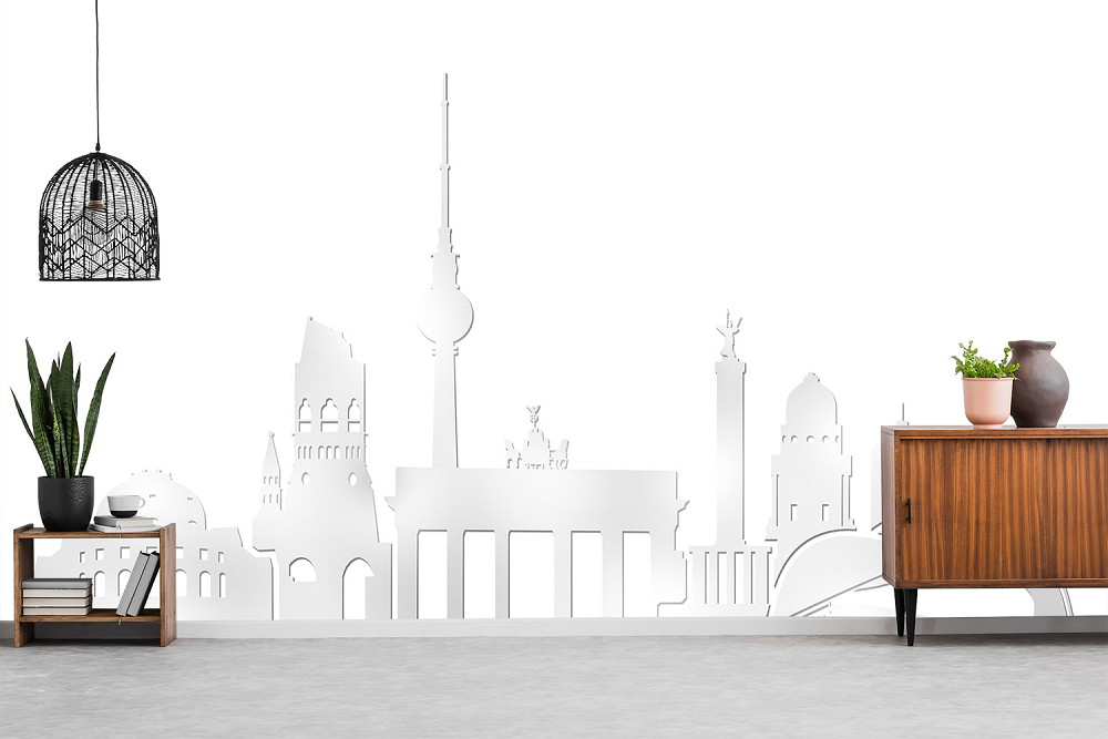 Fototapete - Wand mit Berliner Skyline und moderner Dekoration im Wohnzimmer