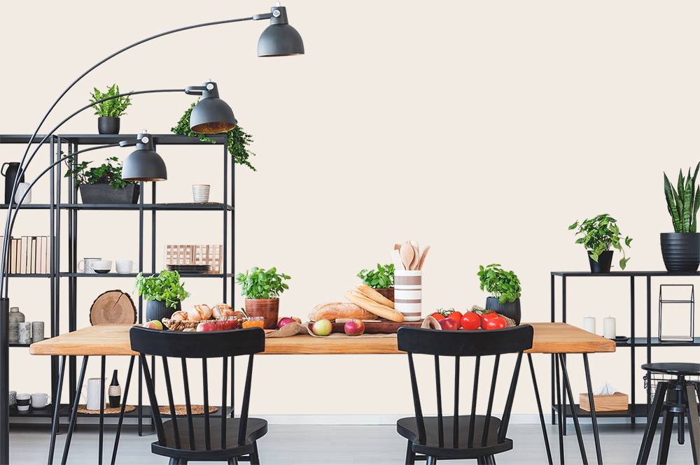 Wall mural - Stylish dining room with wooden table, black chairs and green plants on shelves