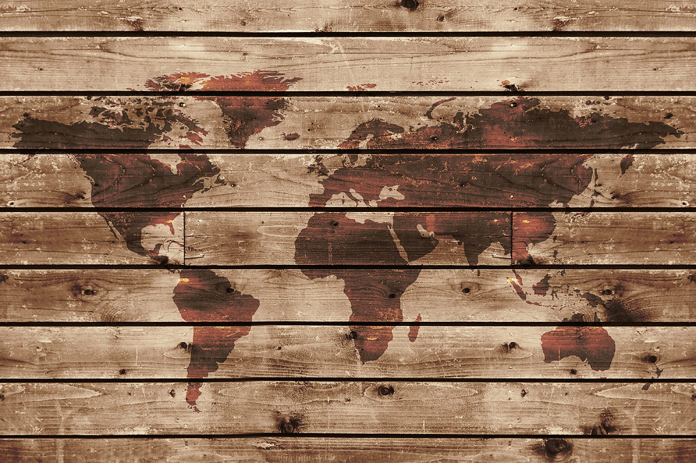 Muurschildering - Vintage wereldkaart op een houten oppervlak
