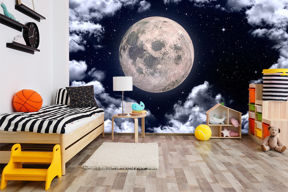 Muurschildering - Kinderkamer met bed, speelgoed en grote maanachtergrond