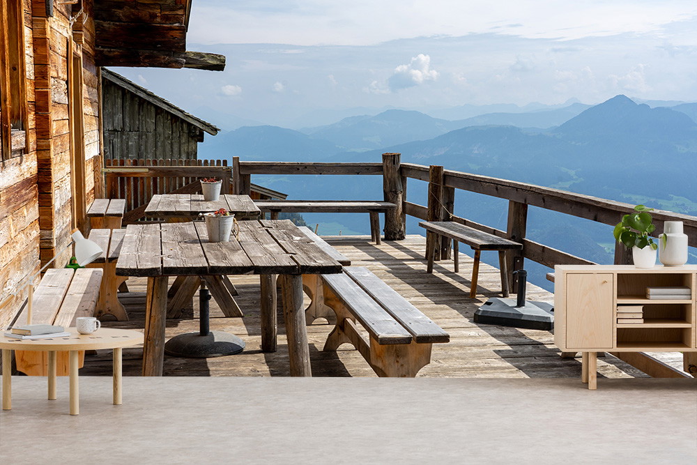 Fototapete - Holzveranda in den Bergen mit Blick auf die Alpenlandschaft