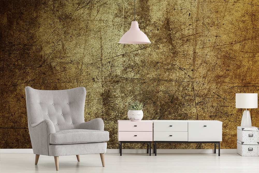 Papier peint photo - Salon confortable avec un mur à texture rugueuse, un fauteuil gris, un buffet blanc et une lampe suspendue