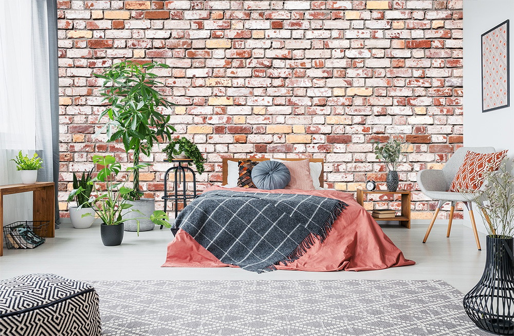 Fototapete - Schlafzimmer mit Backsteinwand, stilvollen Pflanzen und gemütlichen Möbeln