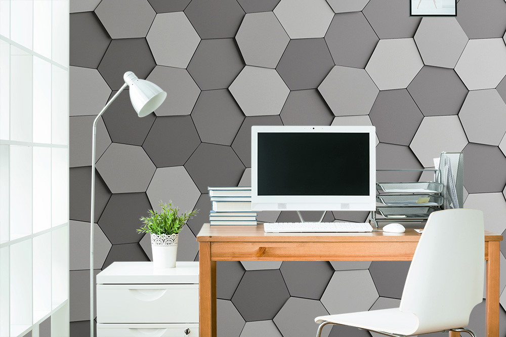 Muurschildering - Bureau met witte stoel en lamp voor een muur met grijze zeshoekige patronen