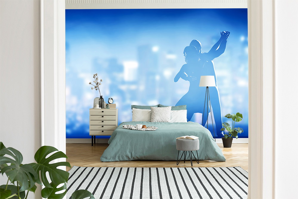 Wall mural - Bedroom with dancing couple silhouette on blue wallpaper in the background