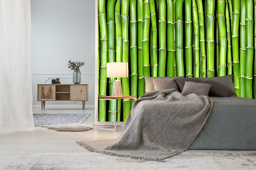 Wall mural - Bedroom with bed, grey ceiling and impressive green bamboo wallpaper on the wall