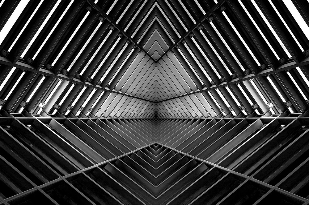 Wall mural - Black and white architecture with symmetrical lines and geometric pattern