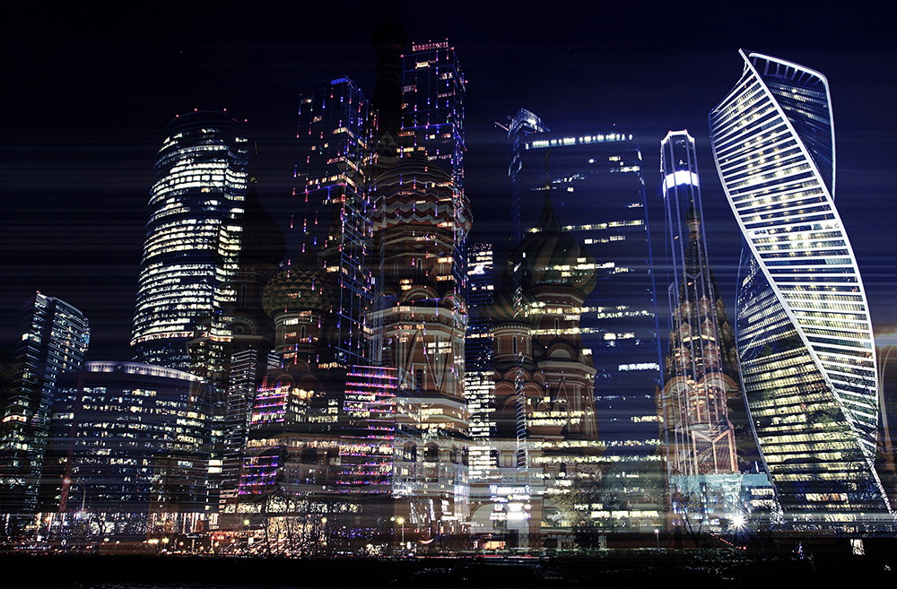 Wall mural - Night skyline with brightly lit modern skyscrapers