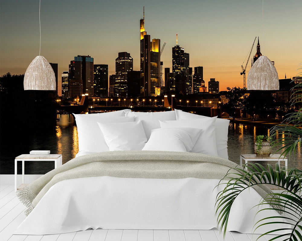 Wall mural - View of the Frankfurt skyline at dusk with a cosy bedroom in the foreground