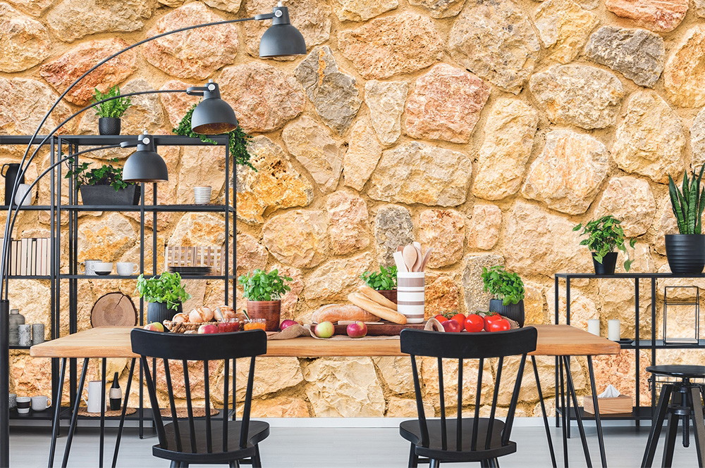 Wall mural - Stylish kitchen with rustic stone wall and modern furnishings