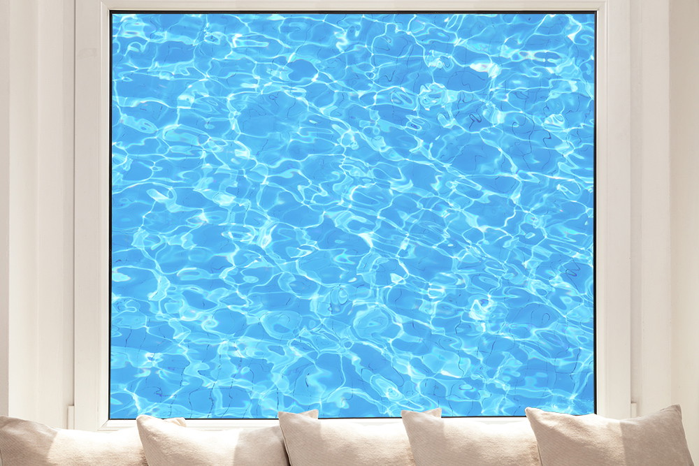 Window film - Light blue, shimmering water that creates a calming environment