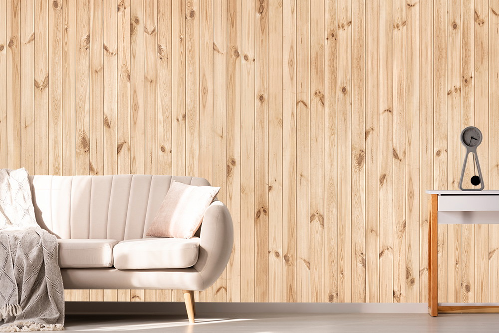Fototapete - Gemütliches Wohnzimmer mit Holzvertäfelung, beigem Sofa und Tisch