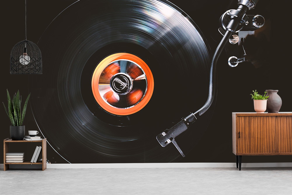 Wall mural - living room with large vinyl record on the wall and decorative plants and furniture
