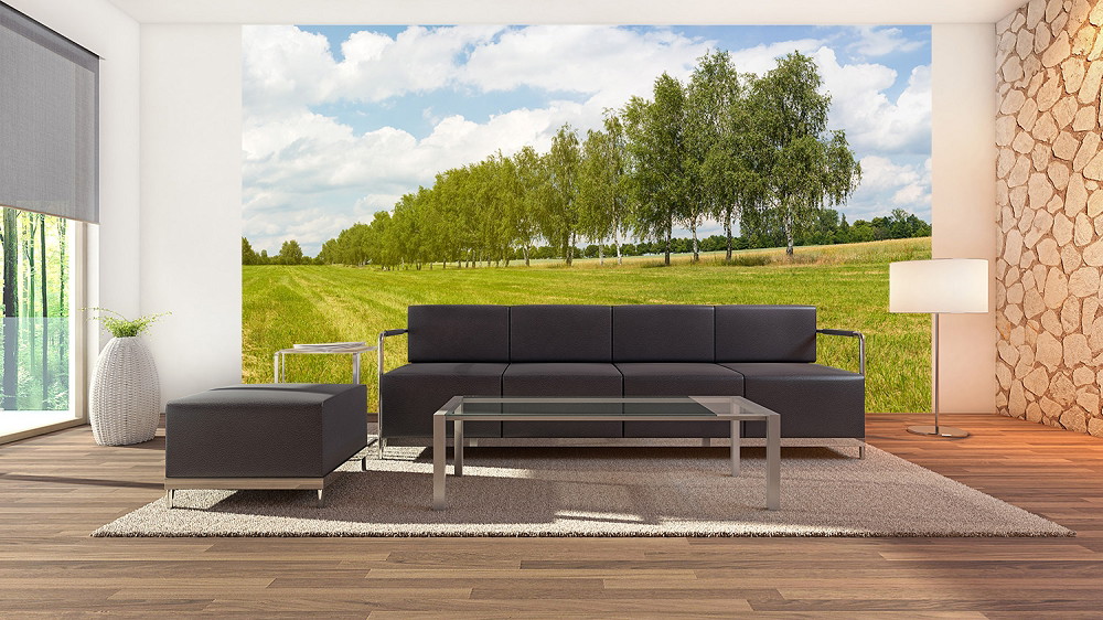 Fototapete - Wohnzimmer mit moderner Einrichtung und großartiger Naturlandschaft mit Bäumen und Wiesen als Wandbild