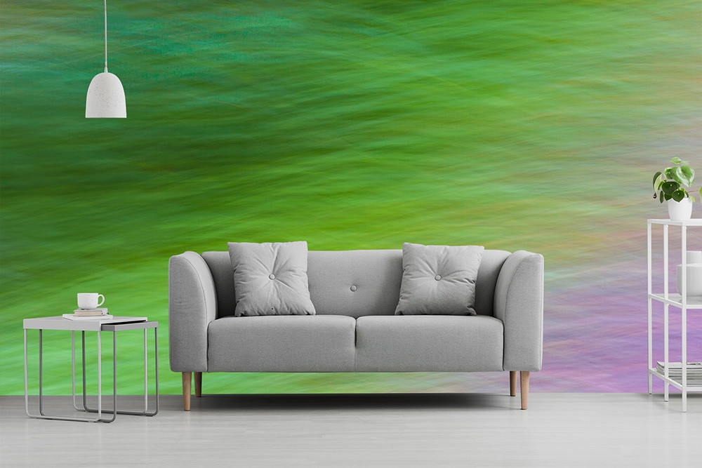 Wall mural - Living room with green wall, grey sofa and white decorative elements