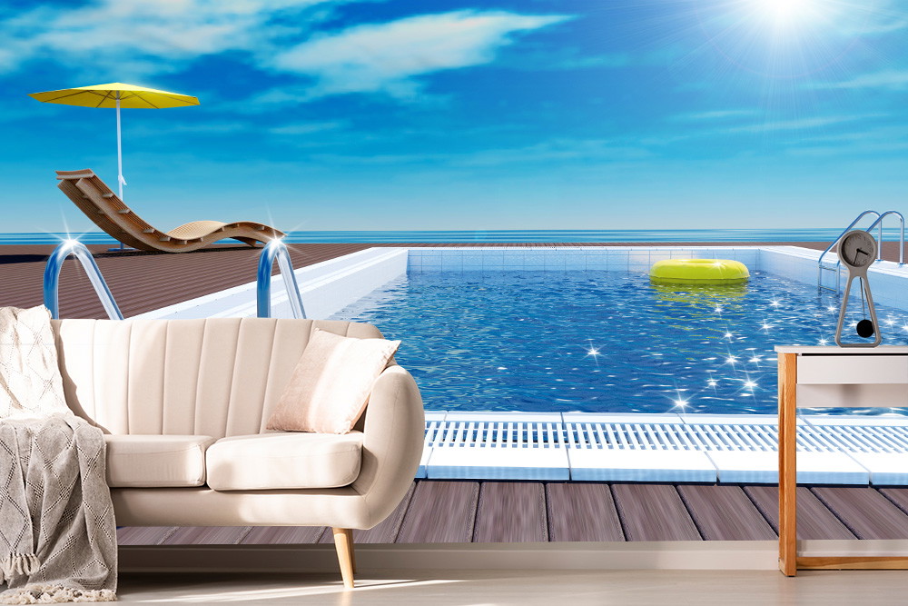 Papier peint photo - Ambiance salon confortable avec vue sur une piscine ensoleillée et une chaise longue