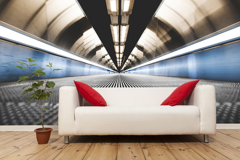 Fototapete - Weißes Sofa mit roten Kissen vor einer Wand mit einem Bild einer futuristischen Passage