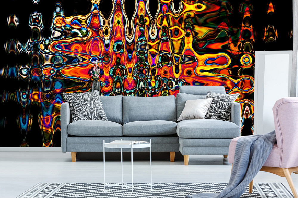 Fototapete - Wohnzimmer mit abstrakter bunter Kunst an der Wand hinter einem grauen Sofa