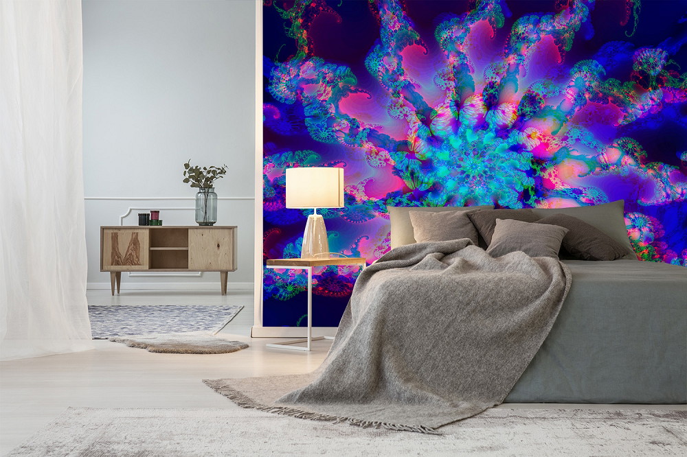 Wall mural - Bedroom with grey bed and colourful fractal wall, modern furnishings with lamp and sideboard