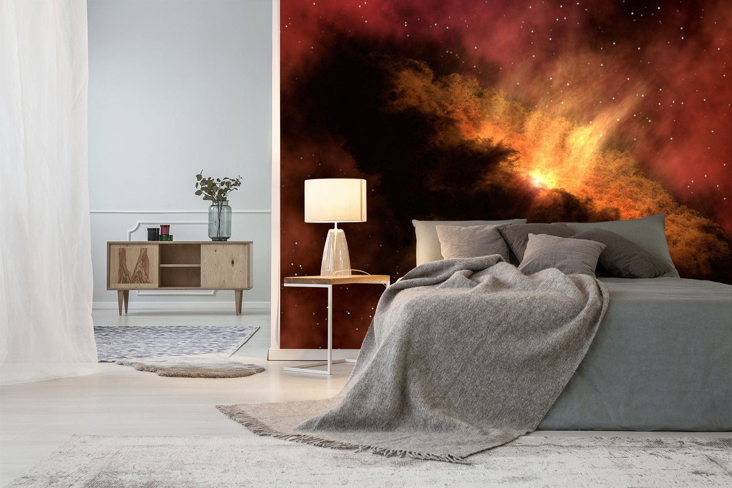 Wall mural - Bedroom with space mural showing a glowing nebula and stars