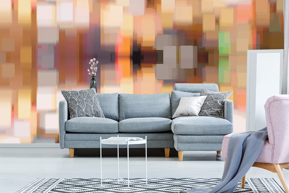 Fototapete - Helles Wohnzimmer mit grauem Sofa und geometrischer Kunst an der Wand