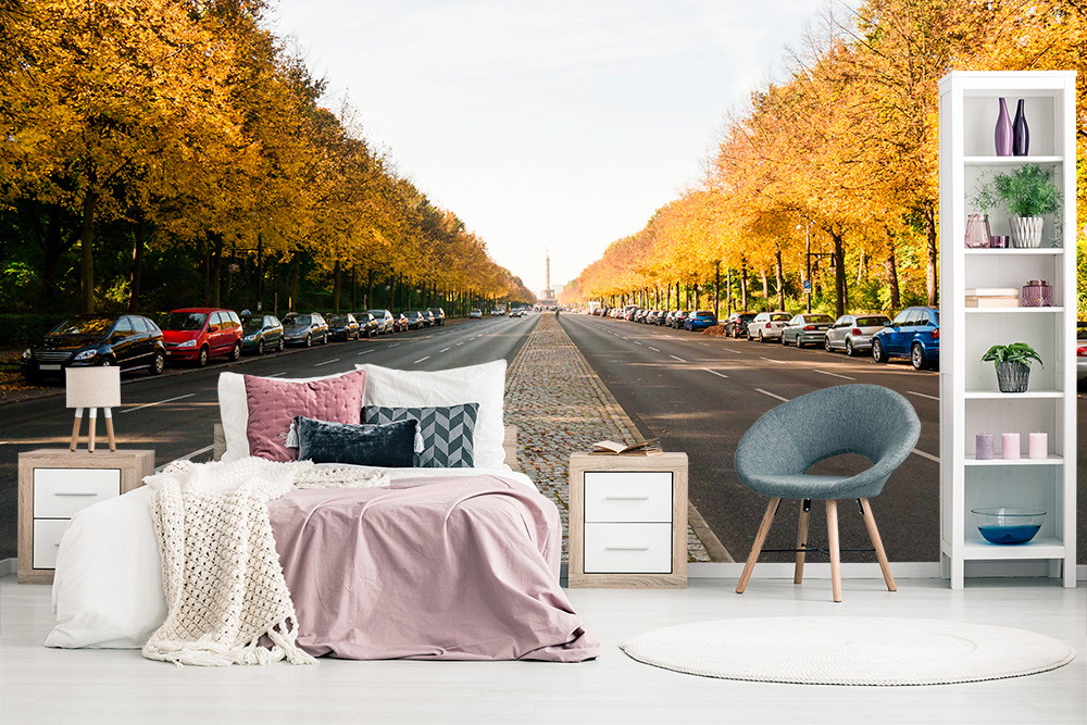 Papier peint photo - vue de la rue dans une ambiance automnale avec des arbres jaunes et des pavés, encadrée par des meubles de chambre à coucher modernes