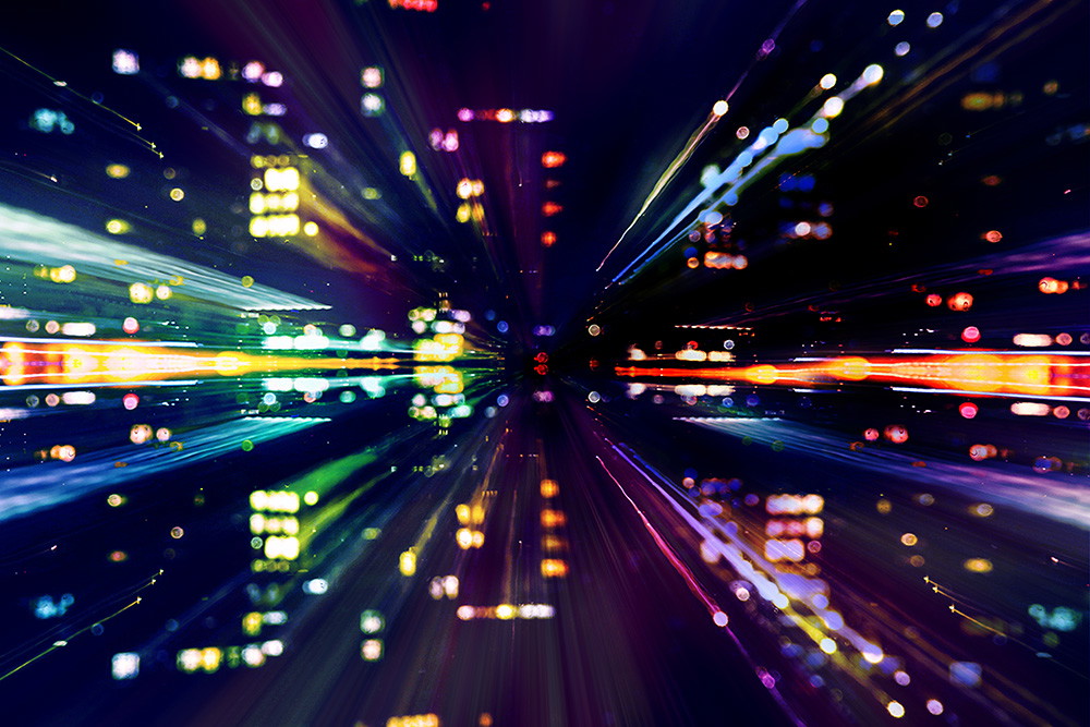 Papier peint photo - bandes de lumière colorées et points qui évoquent la vitesse et l'énergie