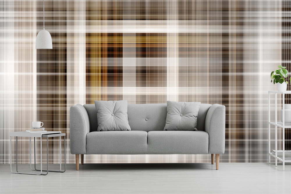 Muurschildering - Moderne woonkamer met grijze bank en schaakbordpatroon op de muur.