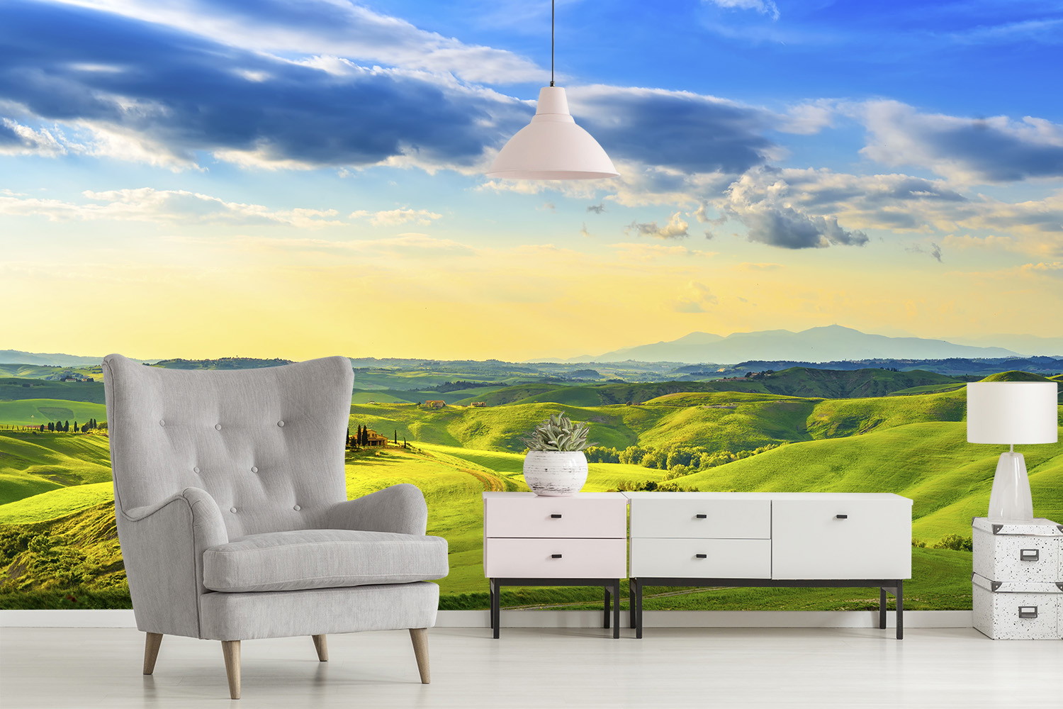Fototapete - Modern eingerichtetes Wohnzimmer mit Blick auf eine weitläufige, sonnige Hügellandschaft im Hintergrund