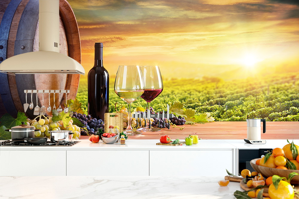 Fototapete - Küche mit Weinfass, zwei Weingläsern, Sonnenuntergang über Weinbergen im Hintergrund