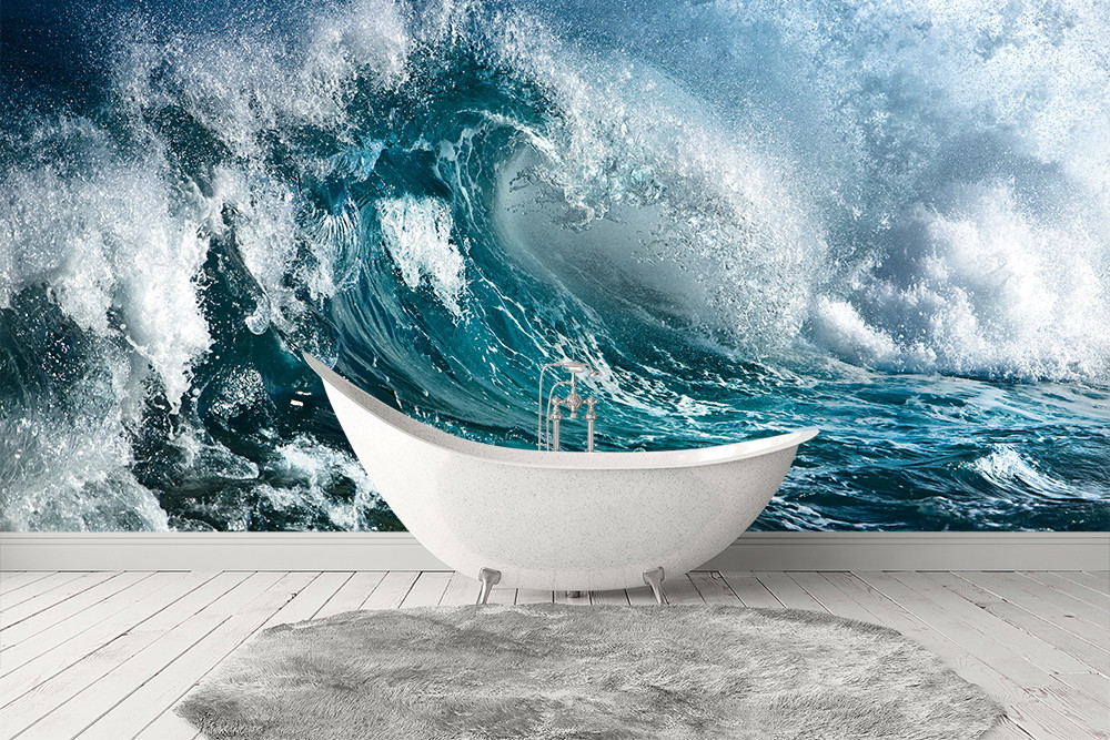 Fototapete - Ein Badezimmer mit einer beeindruckenden Fototapete von gewaltigen Meereswellen im Hintergrund, das den Raum dynamisch und frisch wirken lässt.