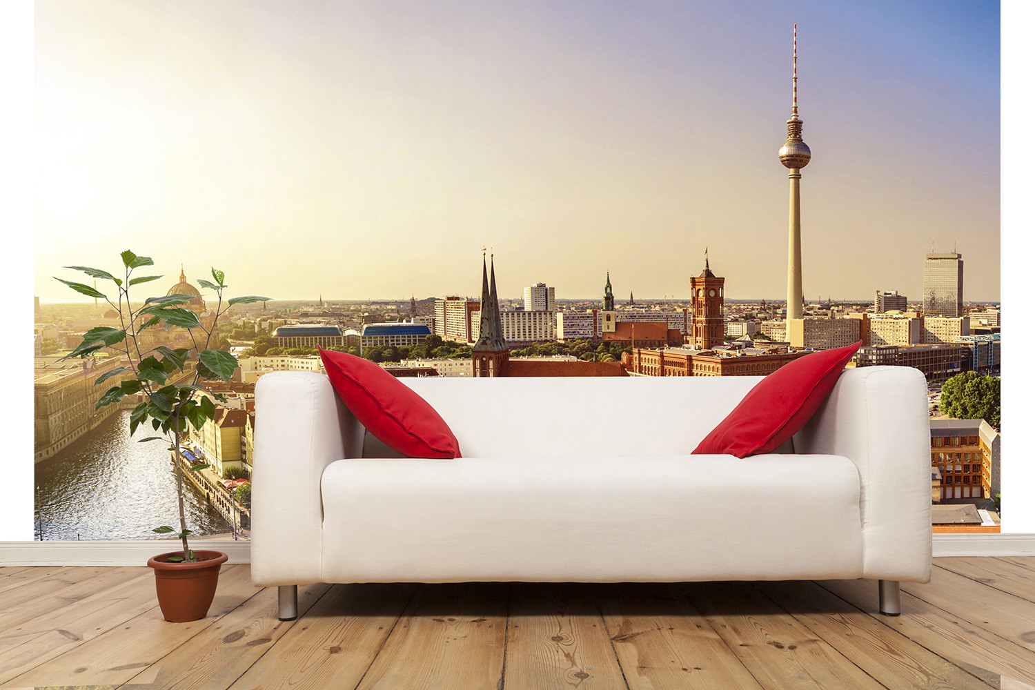 Wall mural - Living room with white sofa and red cushions in front of a wall with Berlin cityscape