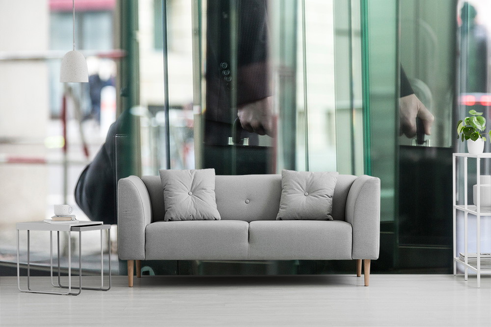 Wall mural - Grey sofa in modern living room in front of wallpaper with glass details and plants