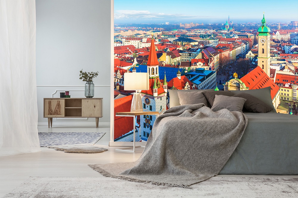 Wall mural - Bedroom with a large city panorama of Munich, reflecting the colourful architecture and vibrant atmosphere