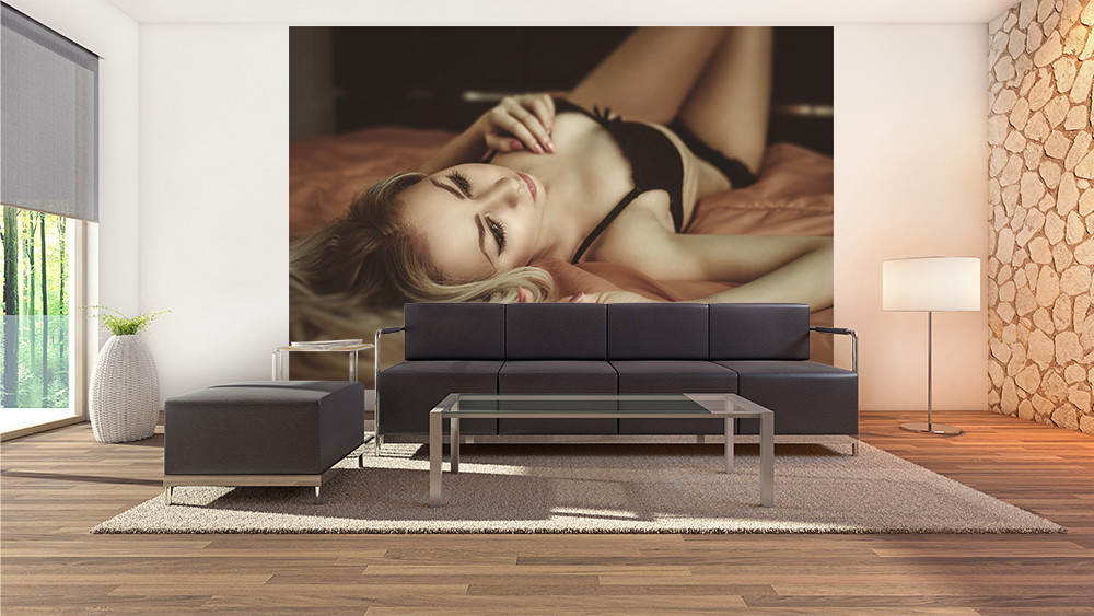 Wall mural - Erotic woman on a bed in underwear
