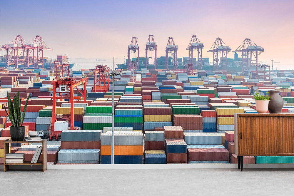 Muurschildering - Havenlandschap met containers en kranen bij zonsondergang