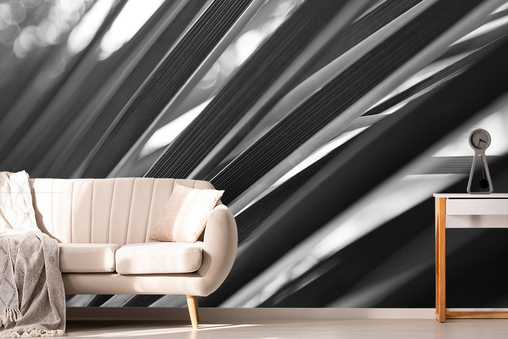 Wall mural - Black and white abstract lines behind a sofa in the living room