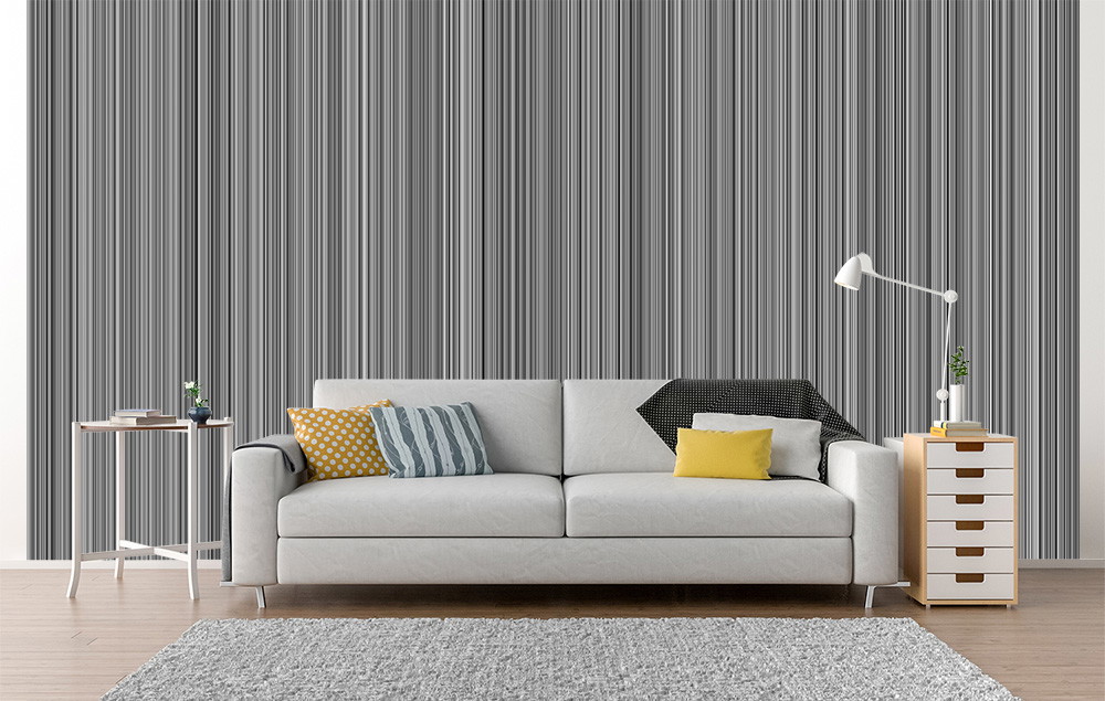 Wall mural - Living room with grey striped wall, modern sofa, patterned cushions and simple furnishings