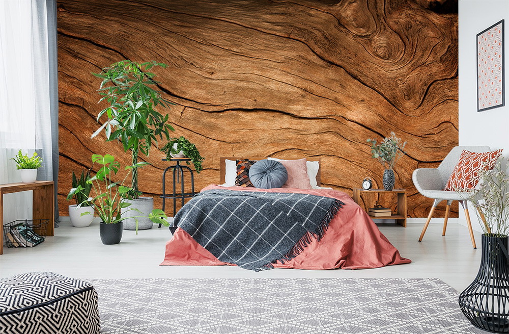 Papier peint photo - chambre à coucher moderne avec un design de mur en bois, décorée avec des plantes et des meubles élégants