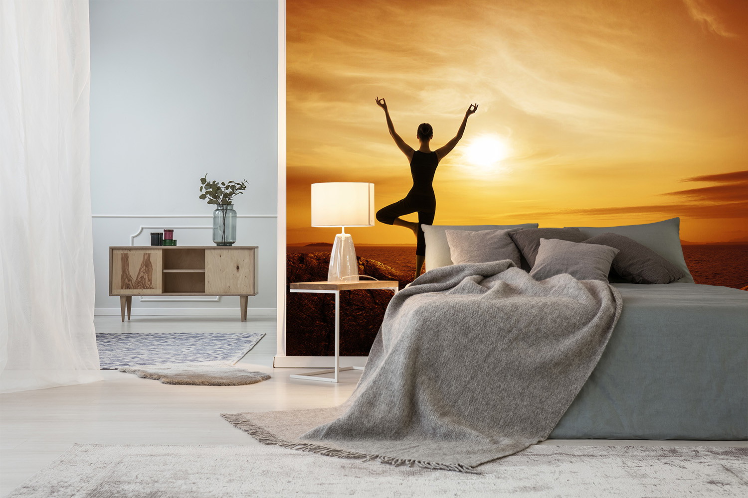Wall mural - Modern bedroom design with a wall mural of a yoga pose at sunset, creating a relaxing atmosphere
