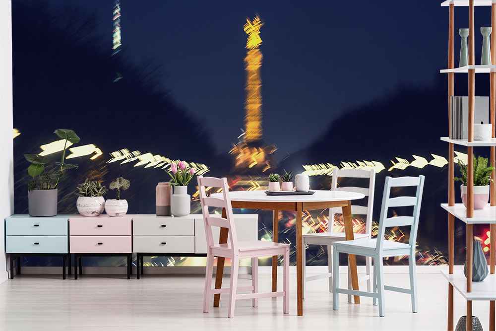 Wall mural - Dining room with modern furnishings and wall mural of a blurred night skyline in the background