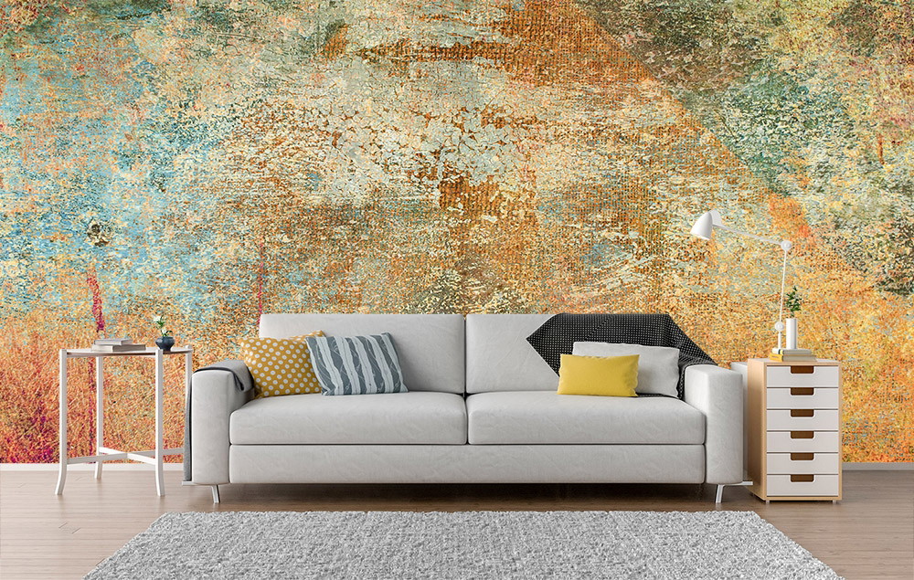 Muurschildering - Woonkamer met moderne inrichting en abstract wandontwerp in aardetinten