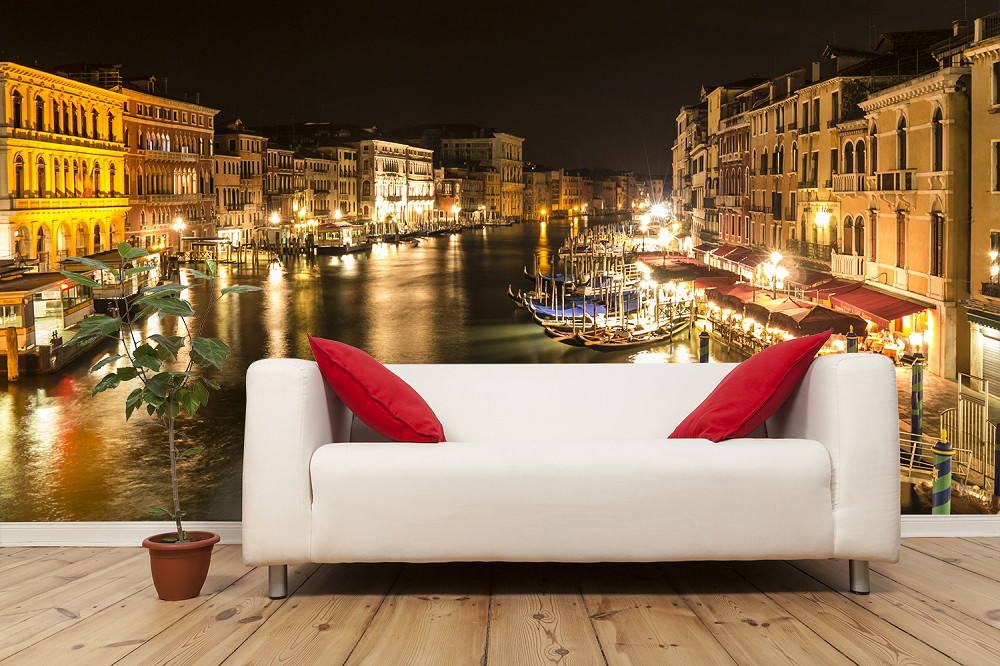 Wall mural - Couch in front of wall mural with night scene of the Grand Canal, Venice, with boats and illuminated buildings